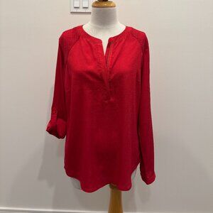 Long sleeve red top with a hidden zipper